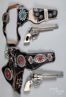 Two cap gun and holster sets