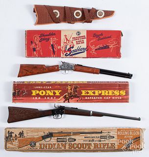 Two boxed toy cap gun rifles