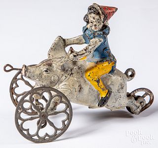 Gong Bell cast iron clown riding a pig bell toy