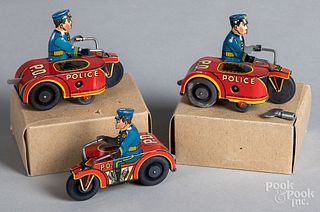 Two boxed Marx tin lithograph wind-up motorcycle
