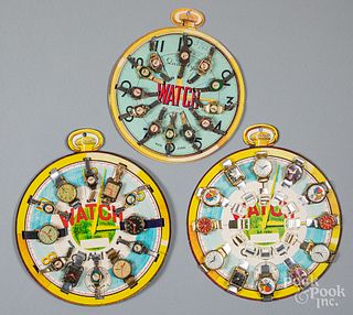 Three Japanese toy watch display