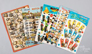 Five toy watch displays on original cards