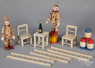 Two Schoenhut circus clowns and accessories