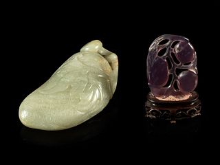 A Celadon Jade 'Lychee' Carving and An Amethyst 'Fruit' Pendant
Length of larger 3 1/2 in., 9 cm 