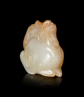 A Yellow Jade Figure of a Recumbent Ram
Height 1 1/2 in., 3.8 cm.
