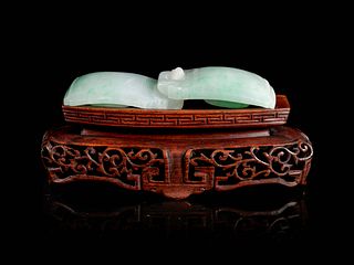 An Apple Green and Pale Celadon Jadeite Two-Part Belt Buckle
Length 4 in., 10 cm.