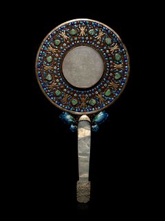 A Jade, Jadeite and Hardstone Inset Filigree and Enameled Hand Mirror
Length 10 1/4 in., 28 cm.