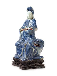 A Blue and White Porcelain Figure of Guanyin
Height 15 in., 38.1 cm.