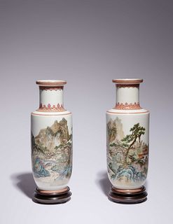 A Pair of Iron Red Decorated Famille Rose Porcelain 'Landscape' Vases
Height 12 1/4 in., 31 cm.