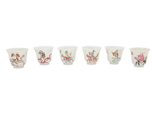 Six White Sgraffito Ground Famille Rose Porcelain "Eight Immortal' Bell-Shaped Wine Cups
Height 2 5/8 x diameter 3 in., 6.67 x 7.62 cm