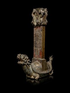 A Bronze 'Tortoise' Stele
Height 13 1/2 in., 34.3 cm.