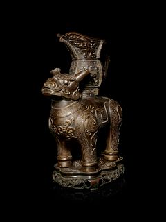 A Bronze Animal-Form Vessel
Height overall 14 3/4 in., 37.47 cm