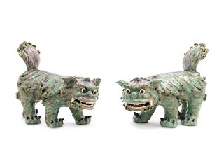 A Pair of Shiwan Red and Green Glazed Stoneware Figures of Fu Lions
Width of figure 14 in., 5.51 cm.