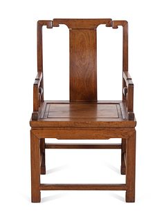 A Huanghuali 'Southern Official's Hat' Armchair, Nanguanmaoyi
Height 39 x width 23 1/4 x depth 19 3/4 inches.