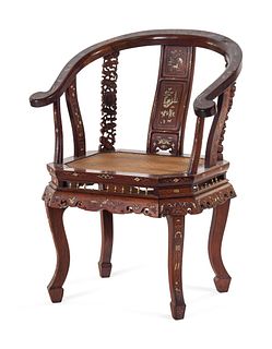 An Embelished Huanghuali Armchair
Height 35 in., 88.9 cm 
