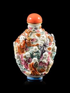 A Famille Rose Molded Porcelain 'Luohan' Snuff Bottle
Height overall 3 1/4 in., 8.3 cm. 