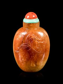 A Russet Jadeite Snuff BottleHeight overall 3 in., 7.6 cm.