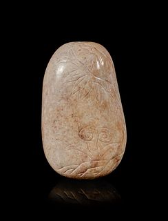 A Burned Jade Pebble-Form Snuff Bottle
Height 2 1/2 in., 6.4 cm.