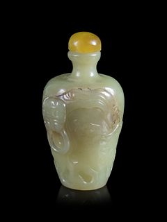 A Carved Yellow Jade 'Crane and Pine' Snuff Bottle
Height 2 5/8 in., 6.7 cm.