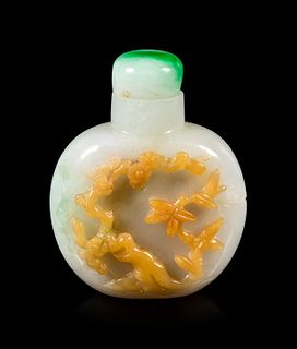 A Russet, Pale Lavender and Greyish White Jadeite Snuff Bottle
Height overall 2 5/8 in., 6.7 cm.