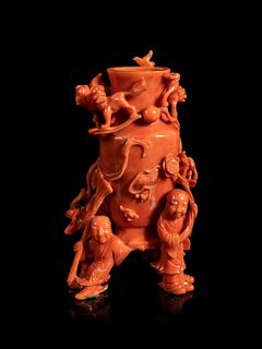 A Carved Red Coral 'Boy' Snuff Bottle
Height 3 1/2 in., 8.9 cm.