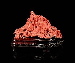 A Red Coral 'Magpie' Carving 
Length 5 3/8 in, 13 1/2 cm. 