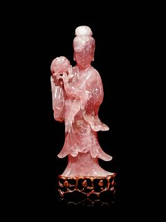 A Large Rose Quartz Figure of Female Immortal
Height of figure 13 1/2 in., 34 cm.