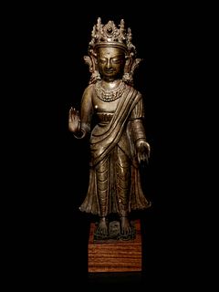 A Large Tibetan Gilt Bronze Figure of Buddha Dipankara 
Height 12 1/4 in., 31.12 cm