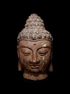 A Carved Wood Head of Buddha
Height 20 in., 50.8 cm