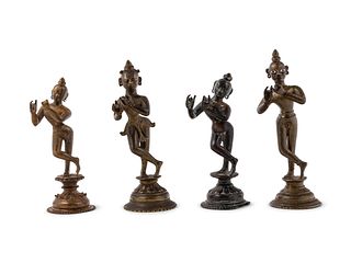 Four Indian Bronze Figures of Attendants
Height of largest 8 1/4 in., 21 cm.