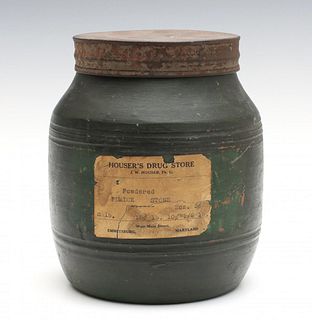 A 19TH CENTURY REDWARE STORAGE JAR IN OLD GREEN PAINT