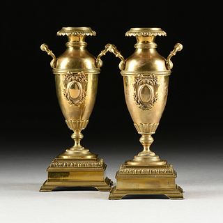 A PAIR OF VICTORIAN TWO HANDLED POLISHED BRASS VASES, 19TH CENTURY,