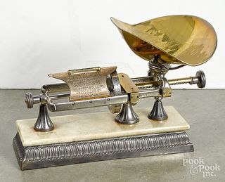 The Micrometer brass and marble counter scale