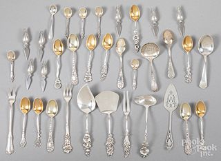 Decorative sterling silver demitasse spoons, etc.