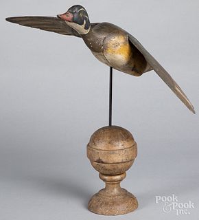 Carved and painted flying wood duck decoy, 20th c