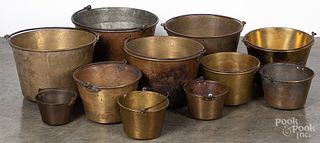 Graduated assembled set of eleven brass buckets