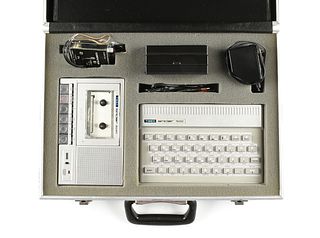 A TIMEX SINCLAIR 1500 PERSONAL COMPUTER WITH TIMEX SINCLAIR 2020 TAPE RECORDER, EARLY 1980s,