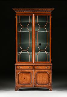 A GEORGE III STYLE CARVED ELM BOOKCASE CABINET, EARLY 20TH CENTURY,