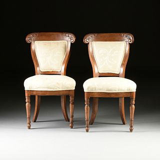 A SET OF THREE LOUIS PHILIPPE CARVED WALNUT SIDE CHAIRS, LATE 1840s, 
