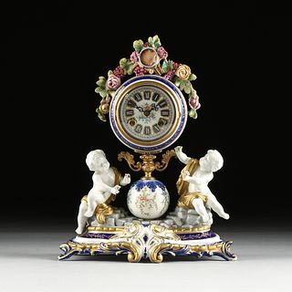 A SÈVRES STYLE PUTTI AND GRAPE CLUSTERS PORCELAIN MANTLE CLOCK, POSSIBLY DRESDEN, GERMAN WORKS BY KIENZLE, 20TH CENTURY, 