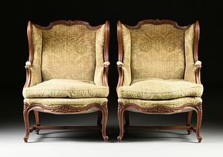 A PAIR OF LOUIS XV STYLE UPHOLSTERED AND CARVED WALNUT BERGÈRES A LA OREILLES, THIRD QUARTER 20TH CENTURY,