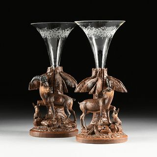 A PAIR OF BLACK FOREST FIGURAL CARVED WALNUT AND GLASS SPILL VASES, POSSIBLY GERMAN/SWISS, LATE 19TH CENTURY,