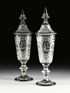 A PAIR OF BOHEMIAN CUT AND ETCHED LIDDED GLASS VASES, LATE 19TH/EARLY 20TH CENTURY,