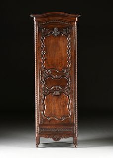 A FRENCH PROVINCIAL CARVED OAK BONNETIÈRE, FIRST HALF 19TH CENTURY,