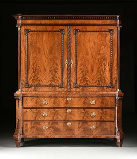 A DUTCH NEOCLASSICAL GILT BRASS MOUNTED FLAME MAHOGANY LINEN PRESS, LATE 18TH/EARLY 19TH CENTURY, 