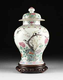 A QING DYNASTY FAMILLE ROSE MAGPIE AND BLOSSOM LIDDED GINGER JAR, QIANLONG MARK, 1644-1912,