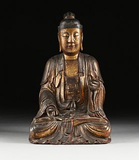 AN ANTIQUE CHINESE PARCEL GILT AND CARVED WOOD FIGURE OF A SEATED BUDDHA, POSSIBLY MING DYNASTY (1368-1644), 
