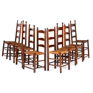 An Assembled Group of Eight Rush Seated Ladder Back Side Chairs