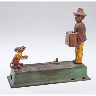 A Cast Iron Mechanical Monkey Bank