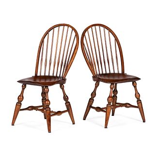 A Pair of Mixed Wood Sackback Windsor Chairs
